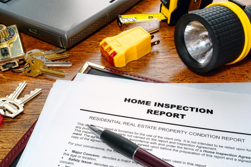 a completed real estate inspection is shown on a desk before a home sale in Philadelphia, PA
