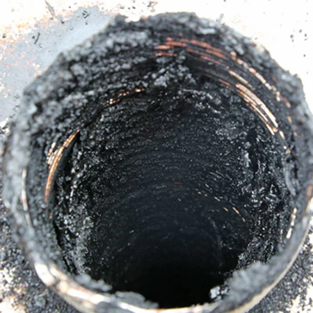 the inside of a flue with creosote in Philadelphia, PA, that could benefit from PCR treatment