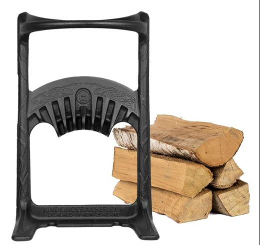 Kindling Cracker King shown with a stack of split logs